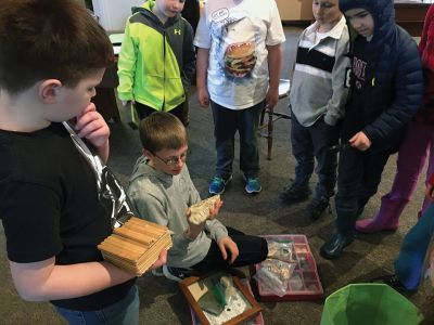 Marion Natural History Museum
On Wednesday, the Marion Natural History Museum's after school group brought in their collections of rocks and minerals, coins, coral, and even Star Wars figures. We spoke about the history of collecting nature-related artifacts worldwide, beginning with "cabinets of curiosities" owned by individuals through modern day museums, and how studying these specimens helps us gain historic perspective. The group explored the museum's collections of minerals, shells, bird eggs and nests, among many other items.
