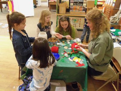 Marion Natural History Museum
On Wednesday, Dec. 10th, the Marion Natural History Museum afterschool group enjoyed working on crafts from nature and recycled materials.  Thank you to all the volunteers who made this such a happy and fun-filled event. Many, many thanks to Grace Moran for her kind donation of frames complete with glass, which the students used to create their own masterpieces for gift-giving. Please keep checking the website for our upcoming list of after-school programs for 2015; www.marionmuseum.org.
