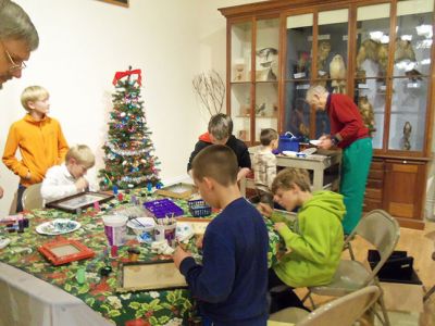 Marion Natural History Museum
On Wednesday, Dec. 10th, the Marion Natural History Museum afterschool group enjoyed working on crafts from nature and recycled materials.  Thank you to all the volunteers who made this such a happy and fun-filled event. Many, many thanks to Grace Moran for her kind donation of frames complete with glass, which the students used to create their own masterpieces for gift-giving. Please keep checking the website for our upcoming list of after-school programs for 2015; www.marionmuseum.org.
