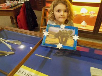 Marion Natural History Museum
On Wednesday, Dec. 10th, the Marion Natural History Museum afterschool group enjoyed working on crafts from nature and recycled materials.  Thank you to all the volunteers who made this such a happy and fun-filled event. Many, many thanks to Grace Moran for her kind donation of frames complete with glass, which the students used to create their own masterpieces for gift-giving. Please keep checking the website for our upcoming list of after-school programs for 2015; www.marionmuseum.org.
