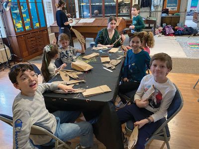 Marion Museum of Natural History
The Marion Museum of Natural History would like to thank Karen Alves Cronin and our volunteer parents for the wonderful program March 15. First, Karen showed us how gravity and a simple bucket suspended on a line and filled with paint can produce beautiful paintings. The students painted their canvases with a colorful background and then placed them under the suspended bucket pendulum. When filled with paint and rotated over the canvases.
