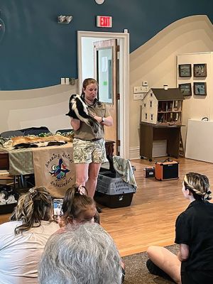 Marion Natural History Museum 
Last week, the Marion Natural History Museum welcomed Bethany Jakubson of Amazing Animal Ambassadors. Bethany brought in some of her most adorable mammals, including a Fennec Fox (native to Africa), a Tenrec (native to Madagascar), a Hedgehog named Peter Quill, a Chinchilla and a skunk. The museum wishes to thank the Marion Cultural Council for helping us to make this program available. Upcoming programs are located at marionmuseum.org. Photo courtesy Elizabeth Leidhold
