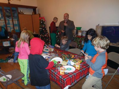 Marion Natural History Museum
The Marion Natural History Museum after-school group enjoyed snacks and craft making during our annual holiday party. Our next set of after-school activities are on the museum’s website: www.marionmuseum.org.  Happy Holidays from the Marion Natural History Museum and see you in 2014!    Marion Natural History Museum holiday party Photo courtesy of Vin Malkoski
