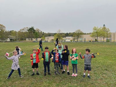 Marion Natural History Museum
The Marion Natural History Museum’s afterschool group had a terrific time constructing their own rockets for launching. This program was so popular it had to be offered twice! The kids had a hands-on introduction to the engineering principles of propulsion and lift. Every rocket managed a successful launch hundreds of feet in the air, and most were safely carried down by the parachutes. The Museum wishes to thank volunteers Mike Cronin and his son Jake for the great program. Photos courtesy Elizabeth Leidho
