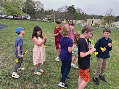 Marion Natural History Museum
The Marion Natural History Museum’s afterschool group had a terrific time constructing their own rockets for launching. This program was so popular it had to be offered twice! The kids had a hands-on introduction to the engineering principles of propulsion and lift. Every rocket managed a successful launch hundreds of feet in the air, and most were safely carried down by the parachutes. The Museum wishes to thank volunteers Mike Cronin and his son Jake for the great program. Photos courtesy Elizabeth Leidho
