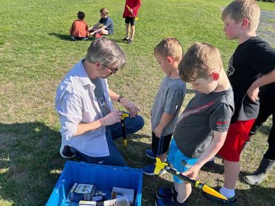 Marion Natural History Museum
Many thanks to Mike Cronin for sharing his rocketry expertise with our afterschool group. We learned about what’s needed for lift-off and propulsion, as well as how to add the “recovery wadding” and parachute to ensure the rocket doesn’t get damaged. The kids had a wonderful time counting down and watching each of the rockets launch. The museum’s upcoming programs are listed at the museum website: www.marionmuseum.org. Hope to see you soon. Photo courtesy Elizabeth Leidhold
