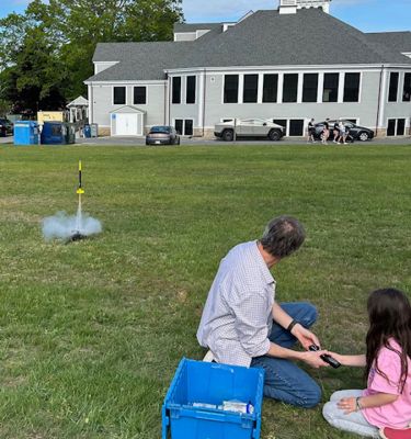 Marion Natural History Museum
Many thanks to Mike Cronin for sharing his rocketry expertise with our afterschool group. We learned about what’s needed for lift-off and propulsion, as well as how to add the “recovery wadding” and parachute to ensure the rocket doesn’t get damaged. The kids had a wonderful time counting down and watching each of the rockets launch. The museum’s upcoming programs are listed at the museum website: www.marionmuseum.org. Hope to see you soon. Photo courtesy Elizabeth Leidhold
