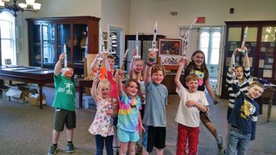 Rockets
This past Wednesday and Thursday the Marion Natural History Museum's afterschool groups constructed their own rockets.  During lift off some went incredible distances, one ending up on a roof and at least one in a tree.  The kids and the parents all had a great time. The Museum wishes to thank Mike and Alex Cronin of "Design Principles" for volunteering to help us construct and lift off the rockets, and all the many parents who stuck around to help with the construction and clean up afterward.  
