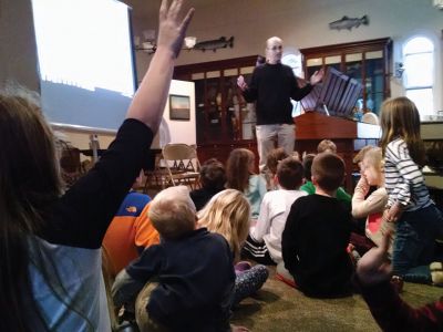 Marion Natural History Museum
Dr. Michael Moore of Woods Hole Oceanographic Institute, using the museum's harpoon and baleen, introduced the Marion Natural History Museum's after-school group to a little of Marion's whaling history. Students could ask questions and theorize why Sippican Harbor had the first recorded visit from a humpback whale this fall. We wish to thank Dr. Moore for the great program. Photo courtesy Elizabeth Leidhold
