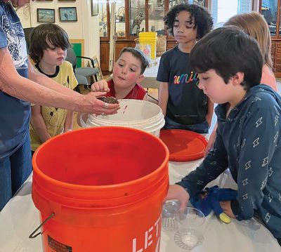 Marion Natural History Museum
The Marion Natural History Museum’s after-school group had fun with hands-on inspections of some of our local amphibian species. We took a look at Green frog tadpoles, Wood frog and salamander egg masses. We also looked at some of our aquatic invertebrates, such as Water boatman, Caddisfly larvae and others that help by breaking down the leaves at the bottom of the pool and starting the forest food chain. Check out our upcoming programs at marionmuseum.org. Photo courtesy Elizabeth Leidhold
