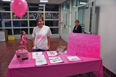 Movie Night
Rochester Memorial School Speech/ Language instructor Darbi Lambert-Matos along with her walking partner Jennifer DaCosta hosted a 'Movie Night' fundraiser at RMS on Friday evening January 20, benefitting the Susan G. Komen for the Cure Fund for the prevention and cure for breast cancer. The night's movie was the Disney feature ‘Snow Buddies’ with the event taking place in the school’s cafetorium. Photo by Robert Chiarito
