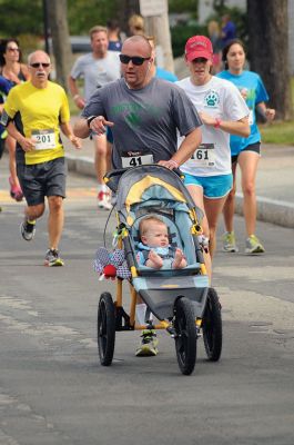 Marion Village 5K
The Marion Village 5K is in its 19th year, and over 250 participants turned out to run the 3.1-mile course along the waterfront and through the quaint Marion village. Runners of all ages took part in the race, and the top 20 runners all finished in less than 20 minutes. Photos by Felix Perez
