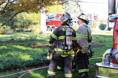 Marion Fire
An attic at 295 Delano Road caught fire on Monday, prompting response from Marion Fire/EMS and mutual aid from Wareham, Mattapoisett and Rochester fire departments. Firefighters cut a hole in the roof and quickly extinguished the fire, preventing further damage. Marion Fire Chief Brian Jackvony publicly thanked his department’s mutual-aid partners for their quick response and professionalism. Photos by Mick Colageo and courtesy Marion Fire Department
