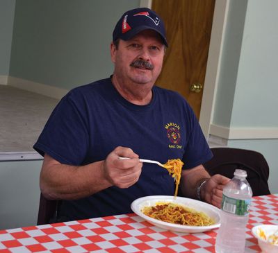 Marion Firefighter’s Association 
The Marion Firefighter’s Association held a spaghetti dinner fund raiser on Saturday. Chief Joyce is seen above serving up the good stuff. Photo by Jean Perry
