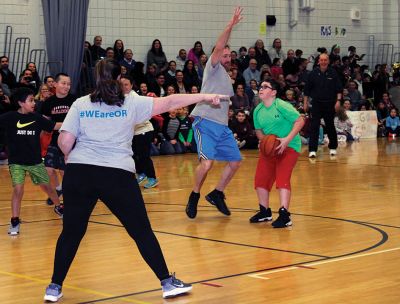 RMS Students vs. Staff Basketball Game
Tough luck again this year for the sixth graders at RMS during the annual students vs. staff basketball game on Friday night. Although students were able to tie the game and gain a temporary slight lead, in the end the staff’s moves took them down, 60-56. Fifth graders, it’s up to you next year! Photos by Deina Zartman
