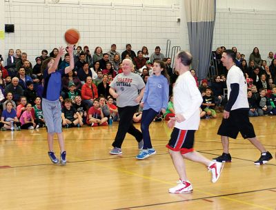 RMS Students vs. Staff Basketball Game
Tough luck again this year for the sixth graders at RMS during the annual students vs. staff basketball game on Friday night. Although students were able to tie the game and gain a temporary slight lead, in the end the staff’s moves took them down, 60-56. Fifth graders, it’s up to you next year! Photos by Deina Zartman
