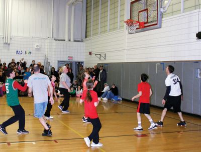 RMS Students vs. Staff Basketball Game
Tough luck again this year for the sixth graders at RMS during the annual students vs. staff basketball game on Friday night. Although students were able to tie the game and gain a temporary slight lead, in the end the staff’s moves took them down, 60-56. Fifth graders, it’s up to you next year! Photos by Deina Zartman
