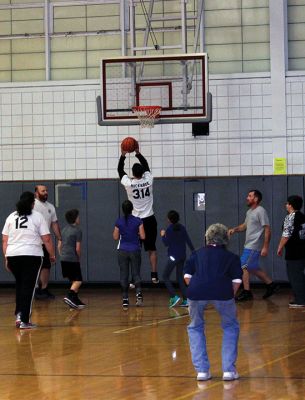 RMS Students vs. Staff Basketball Game
Tough luck again this year for the sixth graders at RMS during the annual students vs. staff basketball game on Friday night. Although students were able to tie the game and gain a temporary slight lead, in the end the staff’s moves took them down, 60-56. Fifth graders, it’s up to you next year! Photos by Deina Zartman
