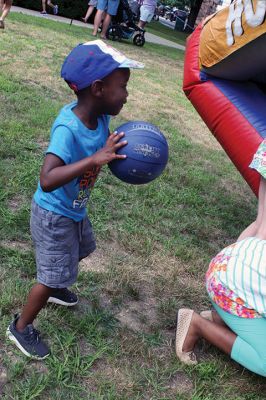 Marion Town Party
Chalk up another successful Marion Town Party as several hundred party-goers found good food and fun on the grounds of the Town House on 8/25. Children of all ages enjoyed inflatable games, climbing the rock wall, or jumping around to music. The annual party has its roots deep in the community and may have started as early at 1900. This year’s event featured live entertainment, a scavenger hunt, and lots of good food. 
