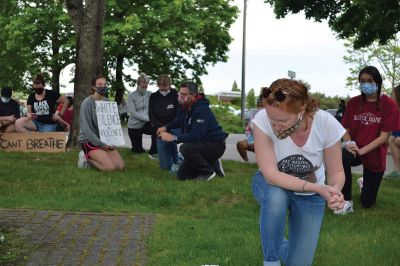 Kneel for Nine
A peaceful crowd gathered on the lawn of the Marion Music Hall on June 2 to kneel in solidarity for nine minutes calling for justice for the death of George Floyd and accountability for police brutality. Marion Police Chief John Garcia dressed in his police uniform was among the roughly 200 kneeling on the grass that afternoon. Photos by Jean Perry
