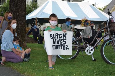 Kneel for Nine
A peaceful crowd gathered on the lawn of the Marion Music Hall on June 2 to kneel in solidarity for nine minutes calling for justice for the death of George Floyd and accountability for police brutality. Marion Police Chief John Garcia dressed in his police uniform was among the roughly 200 kneeling on the grass that afternoon. Photos by Jean Perry
