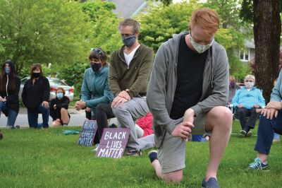 Kneel for Nine
A peaceful crowd gathered on the lawn of the Marion Music Hall on June 2 to kneel in solidarity for nine minutes calling for justice for the death of George Floyd and accountability for police brutality. Marion Police Chief John Garcia dressed in his police uniform was among the roughly 200 kneeling on the grass that afternoon. Photos by Jean Perry
