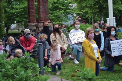 Kneel for Nine
A peaceful crowd gathered on the lawn of the Marion Music Hall on June 2 to kneel in solidarity for nine minutes calling for justice for the death of George Floyd and accountability for police brutality. Marion Police Chief John Garcia dressed in his police uniform was among the roughly 200 kneeling on the grass that afternoon. Photos by Jean Perry
