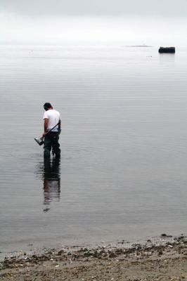 Buried Treasure
Roger Moniz spent the morning at Silvershell Beach surveying for treasure. When asked if he had found anything, he said that they do very well. Photo by Paul Lopes
