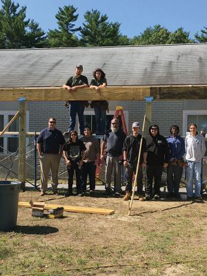 Marion's Cushing Community Center
Junior and senior-year carpentry students from Upper Cape Regional Technical School are building a permanent canopy over the entrance walkway at Marion's Cushing Community Center, formerly the Benjamin Cushing VFW. With the help of the students, the town has been able to fund the materials needed without the associated labor. Previously, Marion residents benefited from the skills of students from UCT when they reconstructed Fire Station 2 located on Point Road. Photos by Marilou Newell
