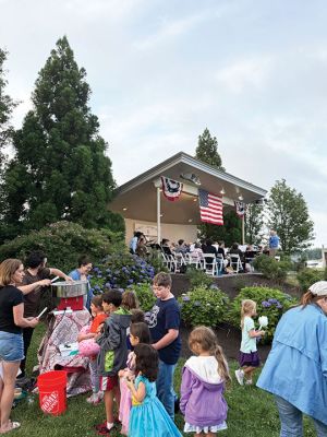 Marion Concert Band
Photos of the Marion Concert Band performing their “A Young People’s Concert” at the amphitheater by Island Warf on Friday, July 11. The band, led by Music Director Tobias Monte, played music from kids’ movies such as “Happy” from Despicable me and many others. There was a cotton candy cart, and many brought popcorn or biked over from houses nearby. The band was present and performed at the July 4 celebrations the week prior. Photos by Sam Bishop
