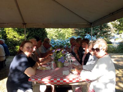 Employee Appreciation Cookout
On Thursday, July 12, the Marion Board of Selectmen and Town Administrator held an employee appreciation cookout for all of the town’s board members and employees. All attendees enjoyed standard barbeque fare underneath a white canopy in Bicentennial Park.  Photo by Joan Hartnett-Barry. 
