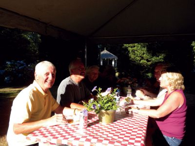 Employee Appreciation Cookout
On Thursday, July 12, the Marion Board of Selectmen and Town Administrator held an employee appreciation cookout for all of the town’s board members and employees. All attendees enjoyed standard barbeque fare underneath a white canopy in Bicentennial Park.  Photo by Joan Hartnett-Barry. 
