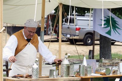 Living History 
It looked like July 8, 1776 at Silvershell Beach in Marion this past Saturday. Folks from the Fairhaven Village Militia and Wareham Militia Group in conjunction with Marion Recreation and the Marion Cultural Council took spectators back in time to Colonial Massachusetts during a weekend-long encampment at the beach. Participants in olde-tyme apparel demonstrated what life was like in the 1770s during the Revolutionary War through demonstrations of drilling, cooking, and flintlock musket use. Photos by Jean 
