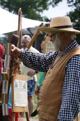 Living History 
It looked like July 8, 1776 at Silvershell Beach in Marion this past Saturday. Folks from the Fairhaven Village Militia and Wareham Militia Group in conjunction with Marion Recreation and the Marion Cultural Council took spectators back in time to Colonial Massachusetts during a weekend-long encampment at the beach. Participants in olde-tyme apparel demonstrated what life was like in the 1770s during the Revolutionary War through demonstrations of drilling, cooking, and flintlock musket use. Photos by Jean 
