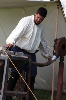 Living History 
It looked like July 8, 1776 at Silvershell Beach in Marion this past Saturday. Folks from the Fairhaven Village Militia and Wareham Militia Group in conjunction with Marion Recreation and the Marion Cultural Council took spectators back in time to Colonial Massachusetts during a weekend-long encampment at the beach. Participants in olde-tyme apparel demonstrated what life was like in the 1770s during the Revolutionary War through demonstrations of drilling, cooking, and flintlock musket use. Photos by Jean 
