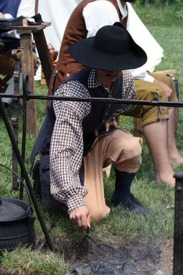 Living History 
It looked like July 8, 1776 at Silvershell Beach in Marion this past Saturday. Folks from the Fairhaven Village Militia and Wareham Militia Group in conjunction with Marion Recreation and the Marion Cultural Council took spectators back in time to Colonial Massachusetts during a weekend-long encampment at the beach. Participants in olde-tyme apparel demonstrated what life was like in the 1770s during the Revolutionary War through demonstrations of drilling, cooking, and flintlock musket use. Photos by Jean 
