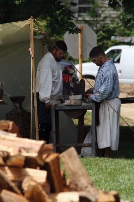 Living History 
It looked like July 8, 1776 at Silvershell Beach in Marion this past Saturday. Folks from the Fairhaven Village Militia and Wareham Militia Group in conjunction with Marion Recreation and the Marion Cultural Council took spectators back in time to Colonial Massachusetts during a weekend-long encampment at the beach. Participants in olde-tyme apparel demonstrated what life was like in the 1770s during the Revolutionary War through demonstrations of drilling, cooking, and flintlock musket use. Photos by Jean 
