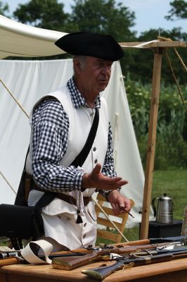 Living History 
It looked like July 8, 1776 at Silvershell Beach in Marion this past Saturday. Folks from the Fairhaven Village Militia and Wareham Militia Group in conjunction with Marion Recreation and the Marion Cultural Council took spectators back in time to Colonial Massachusetts during a weekend-long encampment at the beach. Participants in olde-tyme apparel demonstrated what life was like in the 1770s during the Revolutionary War through demonstrations of drilling, cooking, and flintlock musket use. Photos by Jean 
