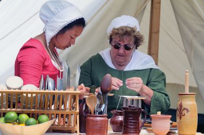 Living History 
It looked like July 8, 1776 at Silvershell Beach in Marion this past Saturday. Folks from the Fairhaven Village Militia and Wareham Militia Group in conjunction with Marion Recreation and the Marion Cultural Council took spectators back in time to Colonial Massachusetts during a weekend-long encampment at the beach. Participants in olde-tyme apparel demonstrated what life was like in the 1770s during the Revolutionary War through demonstrations of drilling, cooking, and flintlock musket use. Photos by Jean 
