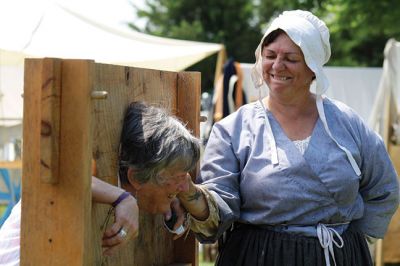 Living History 
It looked like July 8, 1776 at Silvershell Beach in Marion this past Saturday. Folks from the Fairhaven Village Militia and Wareham Militia Group in conjunction with Marion Recreation and the Marion Cultural Council took spectators back in time to Colonial Massachusetts during a weekend-long encampment at the beach. Participants in olde-tyme apparel demonstrated what life was like in the 1770s during the Revolutionary War through demonstrations of drilling, cooking, and flintlock musket use. Photos by Jean 
