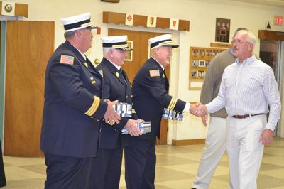 Marion Fire Department
The Marion Fire Department celebrated the careers of three of its retiring firefighters on November 8. Deputy Chiefs William Scott, Charles Blanchette, and Scott Cowell were toasted (and roasted) by Marion Fire Chief Thomas Joyce before family and friends at the Marion VFW Saturday night. The wives of MacDougal and Blanchette, and the daughter of Cowell, attached new deputy chief badges on the three gentlemen during the pinning ceremony, and the three selectmen honored the retiring chiefs with gifts. 
