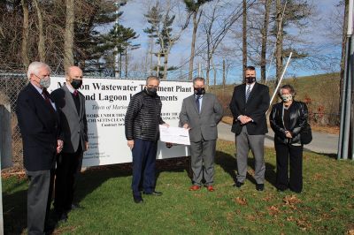 Marion Wastewater Treatment Plant Assistant
Representative William Straus, Marion Sewer Superintendent Frank Cooper, Wastewater Treatment Plant Assistant Operator Nathaniel Munafo, Marion Board of Selectmen Chairman Randy Parker, Finance Director Judy Mooney, Town Administrator Jay McGrail, and Selectmen John Waterman and Norm Hills gathered on April 2 at the wastewater treatment plant off Benson Brook Road, where Straus presented the Marion delegates with a $250,000 check. Photo by Mick Colageo
