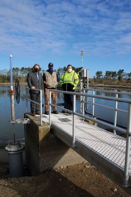 Marion Wastewater Treatment Plant Assistant
Representative William Straus, Marion Sewer Superintendent Frank Cooper, Wastewater Treatment Plant Assistant Operator Nathaniel Munafo, Marion Board of Selectmen Chairman Randy Parker, Finance Director Judy Mooney, Town Administrator Jay McGrail, and Selectmen John Waterman and Norm Hills gathered on April 2 at the wastewater treatment plant off Benson Brook Road, where Straus presented the Marion delegates with a $250,000 check. Photo by Mick Colageo
