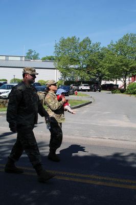 A procession on Front Street that began at the Music Hall culminated with Marion’s Memorial Day Remembrance ceremony at Old Landing. From left, Marion Select Board members Norm Hills, Toby Burr and Randy Parker, Town Administrator Jay McGrail, keynote speaker former U.S. Marines Corporal Jack McLean and master of ceremonies Air Force Major Andrew Bonney. Contributing to the observances were Father Eric Fialho of St. Gabriel’s Episcopal Church, Boy Scouts, Girl Scouts, Cub Scouts and Brownies, the Sippican E
