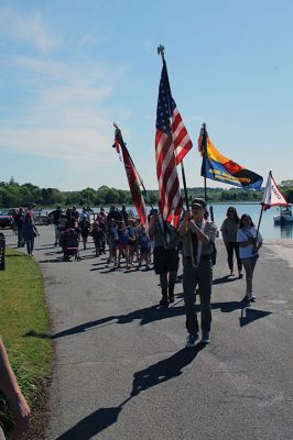 Marion’s Memorial Day 
A procession on Front Street that began at the Music Hall culminated with Marion’s Memorial Day Remembrance ceremony at Old Landing. From left, Marion Select Board members Norm Hills, Toby Burr and Randy Parker, Town Administrator Jay McGrail, keynote speaker former U.S. Marines Corporal Jack McLean and master of ceremonies Air Force Major Andrew Bonney. Contributing to the observances were Father Eric Fialho of St. Gabriel’s Episcopal Church, Boy Scouts, Girl Scouts, Cub Scouts and Brownies, the Sippican E
