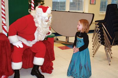 Breakfast with Santa
Marion’s Police Brotherhood held its 3rd annual toy drive and pancake breakfast with Santa at Sippican School on December 6. Families were asked to bring new unwrapped toys, and in return they were given a delicious pancake breakfast and a photo with Santa. The toys are being donated to the Justice Resource Institute, which provides a wide range of services to at-risk families and individuals. Photos by Marilou Newell
