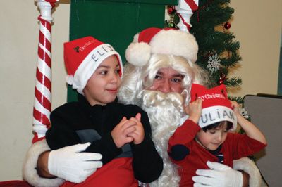 Breakfast with Santa
Marion’s Police Brotherhood held its 3rd annual toy drive and pancake breakfast with Santa at Sippican School on December 6. Families were asked to bring new unwrapped toys, and in return they were given a delicious pancake breakfast and a photo with Santa. The toys are being donated to the Justice Resource Institute, which provides a wide range of services to at-risk families and individuals. Photos by Marilou Newell
