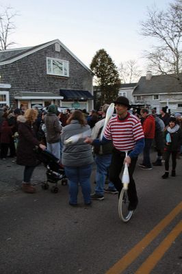 Marion Village Stroll
Cars lined several Marion streets as residents gathered for the town’s Christmas Stroll on December 12. Front Street and connecting village roads were partially closed for the event, as families enjoyed refreshments provided by area merchants at their doorsteps and along the roads. Clydesdale horses escorted Santa Claus and passengers, while the Sippican Elementary School Band played, Tabor Academy student singer Wesley Lai of Hong Kong sang, and a bike rider juggled bowling pins. Photos by Mick Colageo
