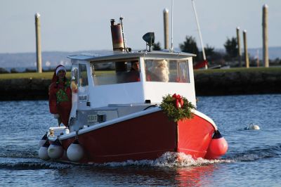 Marion Holiday Stroll
 It was all about Santa on December 10 for the annual Marion Holiday Stroll, although at first the Grinch stole the show (but not Christmas) until Santa made his big arrival at Town Wharf to the chanting of his name, stealing back from the Grinch his rightful place as the center of attention. Photos by Jean Perry
