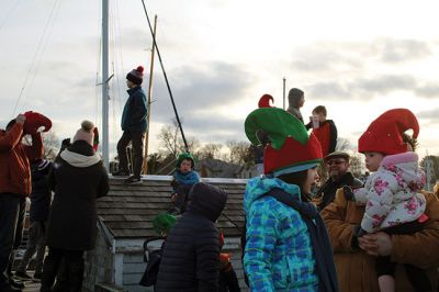 Marion Holiday Stroll 
Here Comes Santa Claus! – Santa made his big entrance to the Marion Holiday Stroll on Sunday, December 8, from across Sippican Harbor on his ‘water sleigh’ to the crowd that awaited him at the Town Wharf. The holiday stroll is the perfect way to get into the holiday spirit and capture a bit of that Christmas magic. Photo by Jean Perry
